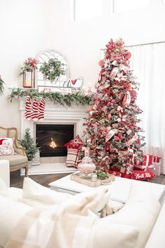 Christmas Trees And Mantels, Flocked Red And White Christmas Tree, Great Room Christmas Decor, Red White And Tan Christmas Tree, Red Gold Flocked Christmas Tree, Red And White Rustic Christmas Tree, Classic Red And White Christmas Tree, Red And White Fireplace Christmas Decor, Elegant Red And White Christmas Tree