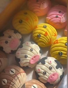 there are many decorated cupcakes that look like animals in the shape of heads