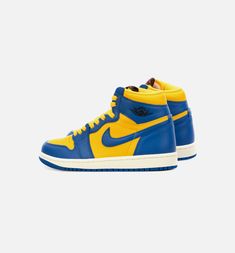 Dressed in a Varsity Maize, Game Royal, Sail, Black, and Fire Red color scheme. This offering of the Air Jordan 1 is basically a “Reverse” edition of 2013’s “Laney” release. It features a Varsity Maize leather base with Royal Blue overlays atop a White midsole and Blue rubber outsole. Red Jordan 1 Outfit, High Top Jordans, Blue Blazer Women, Sneakers Nike Jordan, Royal Blue Blazers, Blue High Tops, Red Jordans, Yellow Sneakers, Blue Jordans