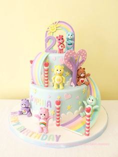 a birthday cake with teddy bears on it