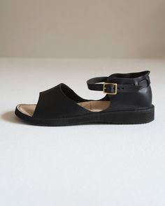 A beautiful, expertly made sandal in a luxury soft black leather that is breathable and molds perfectly to your feet for all day comfort. Versatile and ideal addition to a summer staple wardrobe.