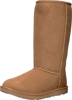 PRICES MAY VARY. Waterproof classic boot Sheepskin lining Rubber sole Ugg Classic Tall, Ugg Classic Short, Boots Ugg, Kids Uggs, Tall Boot, Ugg Classic, Classic Boots, Kids Luggage, Luxury Store