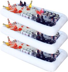 three inflatable drinks coolers filled with bottles and glasses on top of each other