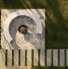 an aerial view of a circular garden design