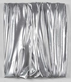 an image of a metallic sheet on a white background