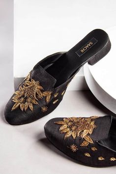 "We stocked up on our two best selling mules for the holiday season! The Autumn Escape slide is one of our staple shoe embroideries featuring golden hand beading and embroidery.  The black silk gives a beautiful opulent feeling and is easy to match with your holiday outfits. These shoes make a beautiful gift as they are completely handmade with fine materials and are comfortable enough to wear all day long. The Fine Details:  1\" Block Heel Silk Fabric Upper Leather insole, sole Slip-on Styling Sizes Available: US 6 If you are in-between sizes, we recommend sizing up. This item will be shipped within 1-3 business days.  I am happy to answer any questions you may have regarding this item. Want to create your own personalized mule? Check out this listing: Like this item? Check out my shop! h Loafer Heels, Staple Shoes, Black Mule, Embroidered Flats, Heeled Mule, Loafer Mules, Gold Embroidery, Shoe Closet, Heeled Loafers