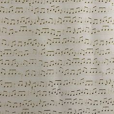 an old sheet of paper with musical notes on it