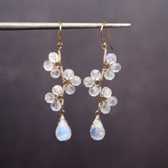 White 14k Gold Filled Bridal Earrings As Gift, 14k Gold Filled White Bridal Earrings As Gift, Delicate White 14k Gold Filled Earrings, Elegant Wedding Moonstone Earrings, Delicate White Crystal Earrings For Gift, Delicate White Dangle Crystal Earrings, Elegant Gold Crystal Earrings With Moonstone, Elegant Moonstone Dangle Crystal Earrings, Delicate Moonstone Wedding Earrings