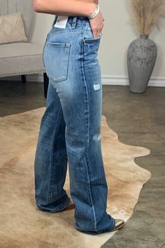 The Hank ~ Wide Leg Distressed Jeans for that Retro Loving Style! ~ High Rise - 11" ~Wide Leg ~Medium Wash ~Distressed detail on front legs ~Inseam - 34" (Longer Length) ~hidden button fly ~100% Cotton ~Kancan Laney is a size 6 wearing a 7/27 Wide Leg Denim Outfit, Outfits With Wide Leg Jeans, Womens Western Outfits, Wide Leg Distressed Jeans, Mom Things, Western Jeans, Boring Clothes, Work Party, Party Outfits