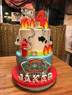 a birthday cake for a fireman on top of a table