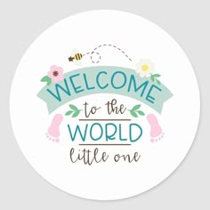 a sticker with the words welcome to the world little one