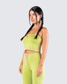 Effortlessly leave them green with envy in this cutesy green tube top 💚 The perfect staple piece for lounging, or slaying in... either way you'll be the top pick 😏 Green Summer Tube Top, Green Strapless Casual Tank Top, Trendy Kelly Green Tops For Spring, Casual Green Strapless Tank Top, Green Bandeau Crop Top For Spring, Green Fitted Trendy Tank Top, Cute Green Top For Loungewear, Fitted Green Sleeveless Tube Top, Green Sleeveless Tube Top For Spring