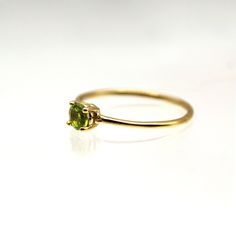 ✦ Custom handmade to order. ✦ Metal: 14k Solid Gold (High Polish) - Rose Gold, Yellow Gold, White Gold ✦ Band Width: Approx. 1.2mm ✦ Metal info.14k Solid Gold (White / Yellow / Rose) High Polished Finish. ✦ Stone info.100% natural Peridot ( Size: 4mm / Color: Yellowish-Green )Associated month: AugustBirthstone Zodiac Sign: Leo and Virgo share the Peridot stone. Meanings: Healing Properties and BenefitsColor: Green, YellowHigh Polished Finish. Peridot:Associated month: AuguestBirthstone Zodiac Si Stone Meanings, Zodiac Sign Leo, Peridot Birthstone, Fine Gold Jewelry, Types Of Gold, Leo And Virgo, Peridot Stone, Gold Alloys, Peridot Gemstone