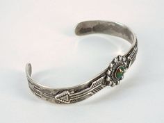 "Here's an old classic bracelet from the 1940s and The Silver Arrow Shop! What a cute little turquoise and silver vintage Fred Harvey Era bracelet. This cute bracelet has traditional stamping and two overlaid arrows. The center piece features a natural turquoise stone. This bracelet measures 4\" inches inside circumference with a 1\" inch opening for a total circumference of 5\" inches. The inside is marked, \"Sterling\" and the \"Silver Arrow\" logo. Very good vintage condition. Sweet gift for Era Bracelet, Silver Arrow, Arrow Logo, Cute Bracelet, Natural Turquoise Stone, Bear Carving, Native American Artists, Turquoise Ring Silver, Classic Bracelets