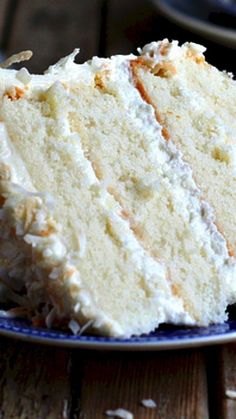 a slice of white cake on a blue plate