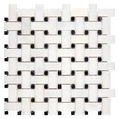 a white and black mosaic tile pattern on a white background with some black dots in the middle