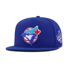 New Era Cap 59Fifty fitted hat for the Toronto Blue Jays in blue colorway, featuring 1993 World Series side patch. Celebrate the Toronto Blue Jays and their 1993 World Series championship with this very special retro on-field from Hat Heaven. Unearthed from New Era archives, this cap is designed with left-sided side patches, which were the norm up until 2016. The absence of New Era side flags brings a breath of fresh air to this classic design. The best part? Kelly Green UV, which were a mainsta Blue Adjustable Flat Cap, Adjustable Blue Flat Cap, Blue Flat Cap For Baseball Season, Blue Fitted Hat For Baseball Season, Blue Fitted Hat For Baseball Season Streetwear, Blue Fitted Hat With Flat Brim For Baseball Season, Blue Flat Brim Fitted Hat For Baseball Season, Blue Flat Cap For Streetwear, Blue Flat Cap Fitted Hat For Streetwear