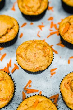 freshly baked carrot muffins on a baking sheet