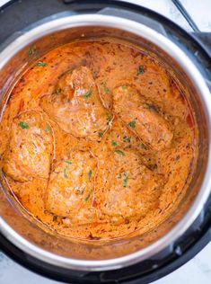 meatballs and gravy in a slow cooker