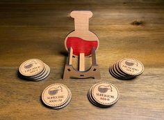 a wooden stamper with six stamps on top of it next to some other ones