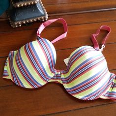 Striped Bra Is Nwt. Size 34c. Double Hook In Back. Underwire With Adjustable Straps. Multicolor Underwire Bra With Padded Cups, Multicolor Padded Underwire Bra, Multicolor Push-up Bra For Summer, Stretch Multicolor Bra, Fitted Multicolor Bra With Padded Cups, Spring Pink Bra With Lined Body, Multicolor Beach Bra For Spring, Spring Beach Push-up Bra, Pink Lined Spring Bra