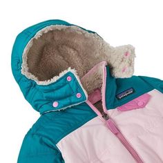 Mountain weather can be completely unpredictable--rain coming in sideways one minute, with the sun making a comeback the next. But if having a three-year-old has taught you anything, it's to always be prepared. Patagonia's Reversible Tribbles Hooded Jacket for Infant Boys comes with two sides: a windproof, waterproof outer layer that helps protect against whipping cold air and a soft, insulated fleece that stays warm even after the storm. So when the clouds emerge overhead and the wind starts to Playful Winter Outerwear For Outdoor Activities, Waterproof Winter Outerwear For Playtime, Playful Pink Outerwear For Outdoor, Playful Green Outerwear For Outdoors, Playful Green Outerwear For Outdoor, Playful Green Outdoor Outerwear, Playful Waterproof Winter Outerwear, Playful Waterproof Outerwear For Winter, Playful Outerwear For Rainy Winter Weather