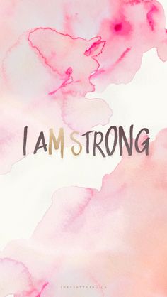 the words i am strong written in black ink on a pink and white watercolor background