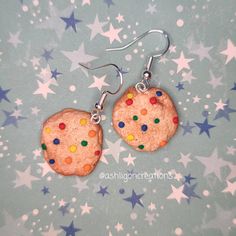 Candy Cookie Earrings Cookies measure approximately between 1.5cm to 2.25cm Materials: ▫ Polymer Clay ▫ Hypoallergenic Hanging Earring Hook Each Cookie is handmade by me, so you may receive a pair of earrings that are slightly different from the ones pictured in the listing. As they are all made by hand all are similar but no two pairs will ever be the same! I can also do custom orders. Please feel free to send me a message with any questions or ideas! Thanks for checking out my shop! Cute Small Nickel-free Earrings, Handmade Novelty Earrings For Everyday, Nickel Free Novelty Earrings For Everyday Wear, Nickel-free Multicolor Earrings For Birthday, Nickel-free Round Resin Earrings, Cute Multicolor Round Earrings, Nickel-free Round Polymer Clay Earrings, Novelty Hypoallergenic Resin Earrings, Cute Hypoallergenic Round Earrings