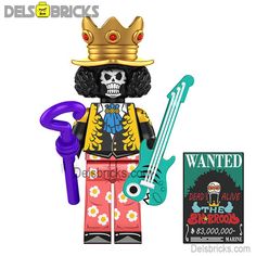 a lego figure with a guitar and crown on it's head, next to a stick