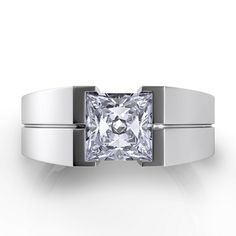 a white gold ring with a princess cut diamond in the center and two bands around it