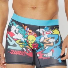 Feature A Licensed Looney Tunes Print. 6" Inseam 92% Polyester, 8% Spandex Fitted Black Boxer Briefs With Graphic Print, Casual Sports Boxer Briefs Multi-pack, Casual Multi-pack Boxer Briefs For Workout, Stretch Boxer Briefs With Letter Print For Streetwear, Stretch Letter Print Boxer Briefs For Streetwear, Multicolor Stretch Boxer Briefs For Sports, Casual Boxer Briefs For Sports Events, Casual Black Go-dry Boxer Briefs, Casual Multi-pack Bottoms For Gym