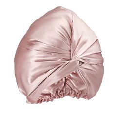 a pink satin head wrap on top of a white background