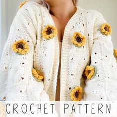 a woman wearing a white crochet sweater with sunflowers on it