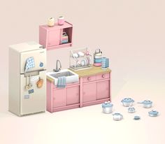 a kitchen with pink cabinets and white appliances