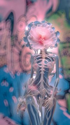 a skeleton holding a pink flower in it's hand