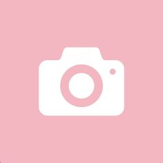 a camera on a pink background