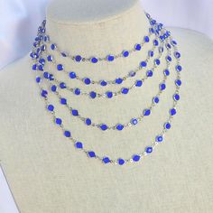 This gorgeous rhodium 80-inch sapphire crystal necklace fits right over your head! No clasps. Wear it as a dynamic single strand, double or triple it! Best for that long shirt look or give a simple outfit a beautiful pop! Makes a stunning wrap-around bracelet https://www.etsy.com/shop/AmysFinery Blue Lariat Jewelry For Party, Blue Crystal Necklace, Simple Outfit, Sapphire Blue, Long Shirt, The Head, Blue Crystals, Sapphire Crystal, Crystal Necklace