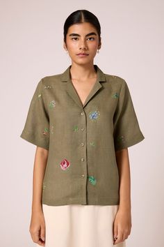 Notch collar shirt made in plush linen. Short sleeves. Back yoke. Modern and mindful. Artwork inspired by vintage cross stitch archives. Embroidered by women artisans in Andhra Pradesh. Garment Measurements in Inches : XS S M L XL Bust 38 40 42 44 46 Waist 38 40 42 44 46 Hip 40 42 44 46 48 Length 24.5 24.75 25 25.25 25.5 Linen Clothes Women, Notch Collar Shirt, Vintage Cross Stitch, Stitch Shirt, Vintage Cross Stitches, Summer Linen, Linen Short, Clothes Women, Notch Collar