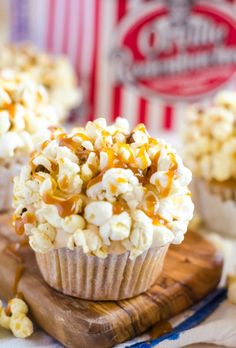 caramel popcorn cupcakes on a wooden cutting board