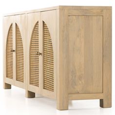 a wooden cabinet with two doors and latticed design on the front, sitting against a white background