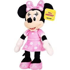 a minnie mouse stuffed animal with a tag on it's ear and pink dress