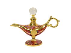 a gold and red glass lamp on a white background