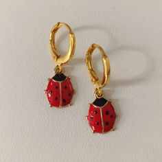 Enameled ladybug earrings and hoops with hypoallergenic gold-colored stainless steel clasp 🐞. Measurements: 1 cm high x 0.8 wide. Ladybug Earrings, Ladybug Jewelry, Animal Earrings, Jewelry Earrings Hoops, Gold Color, Spain, Jewelry Earrings, Hoop Earrings, Stainless Steel