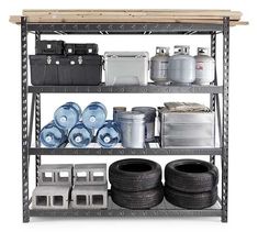 an industrial shelving unit with various types of tires, containers and other items on it