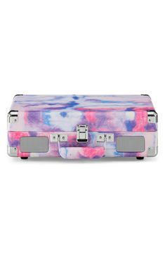 a pink, blue and purple tie dye suitcase with speakers on the front is shown