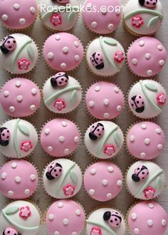 pink cupcakes with ladybugs on them are arranged in rows