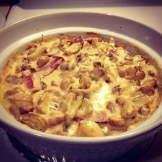 a casserole dish is shown in a bowl on the stove top, ready to be eaten