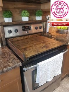 a stove top oven sitting inside of a kitchen next to a counter with pots on it