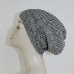 a crocheted hat with the text free moss stitch slouch hat circular