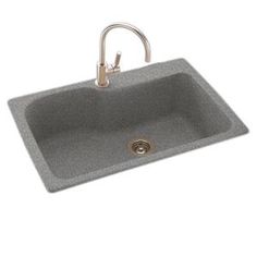 a gray sink with a faucet and chrome faucet on the side